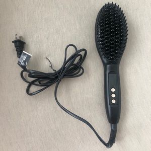 Heated hair straightening brush